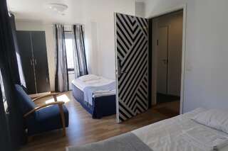 Хостелы Hostel Villa Kemi Кеми Двухместный номер с 2 отдельными кроватями и собственной ванной комнатой-3